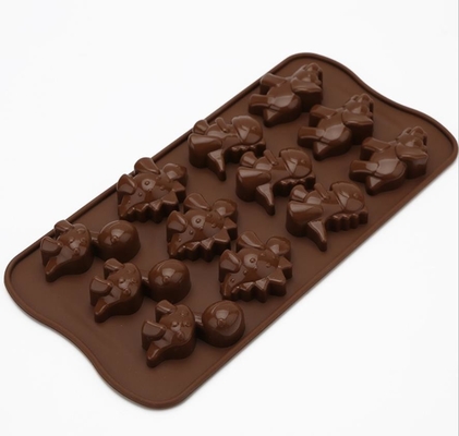 El chocolate del silicón del día de fiesta del dinosaurio moldea el color de Brown no dañino