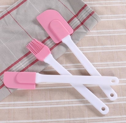 Cepillo a prueba de calor plástico duro de la espátula, silicón que cocina color rosado de la espátula