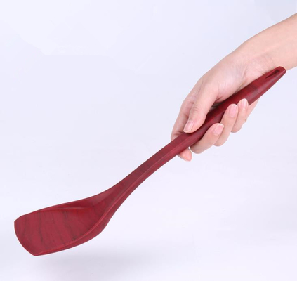 El grano de madera diseña el silicón Turner de la categoría alimenticia que cocina las herramientas para la cacerola antiadherente