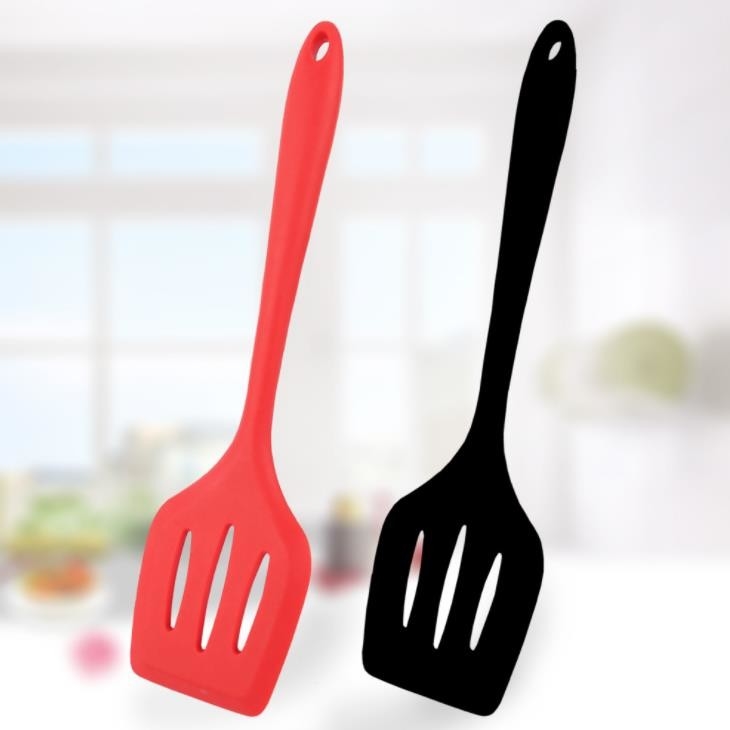 La categoría alimenticia del color sólido diseña a Turner ranurado silicón que cocina las herramientas